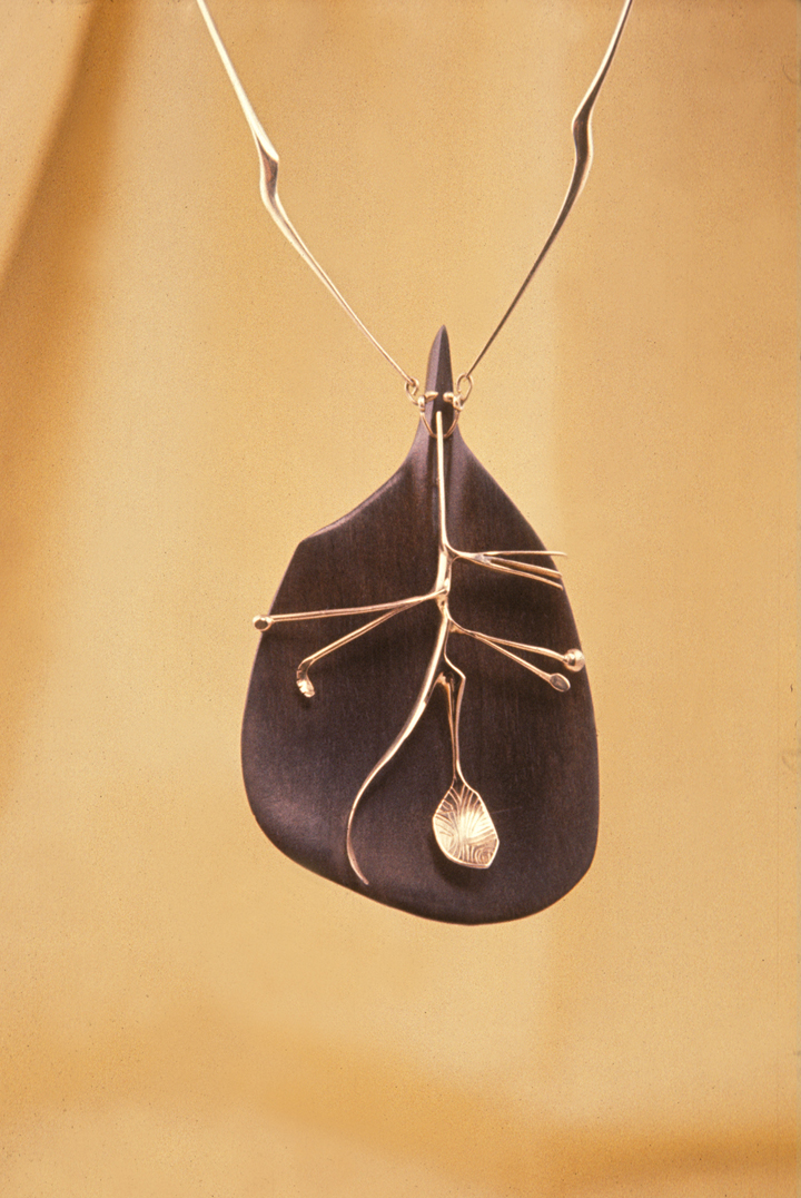 Toza, pendant, gold over ebony, 1960s